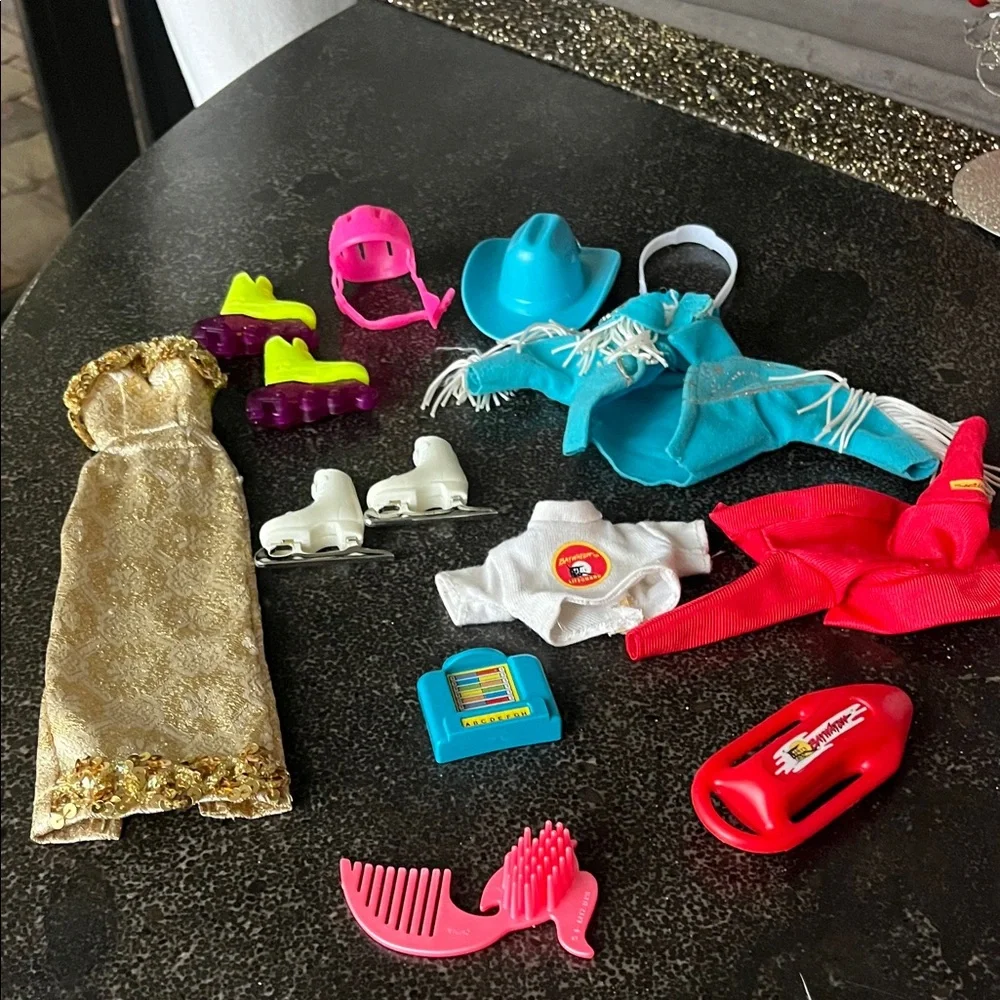 Vintage 1990s Barbie doll bundle of accessories. Gown, rodeo, Baywatch, skater.